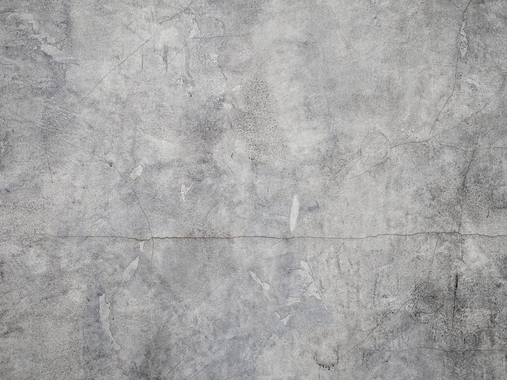 Voorbeelden van natuursteen in je interieur: lavasteen vloer met elegante textuur en warme kleuren